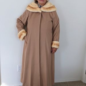 Cashmere wool blend coat with mink cuffs and hood.